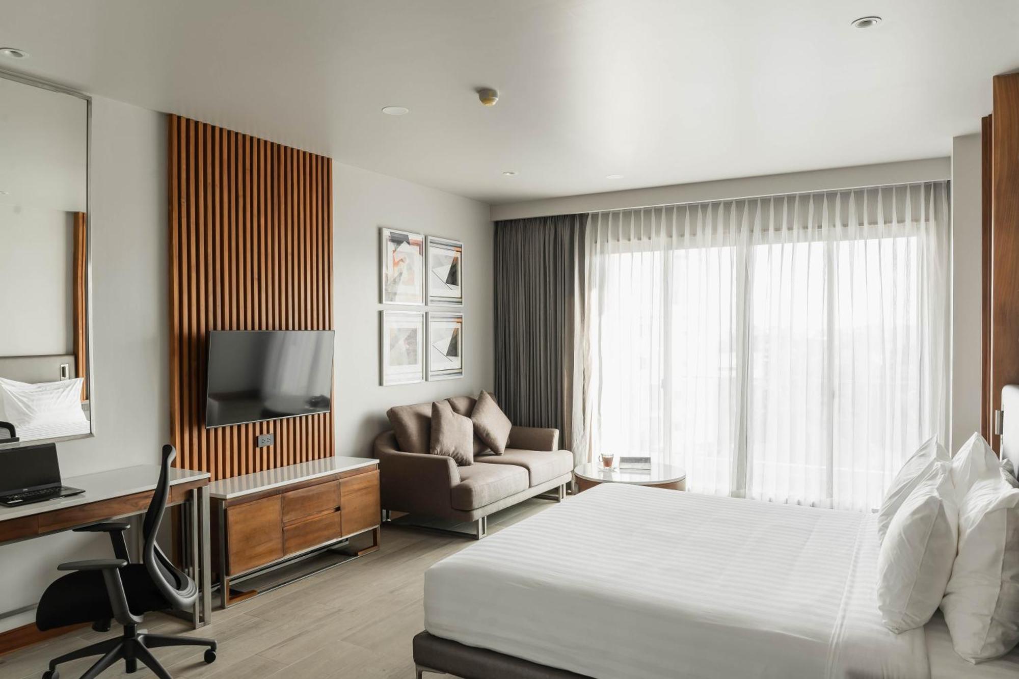 Sn Residences Виентиане Стая снимка